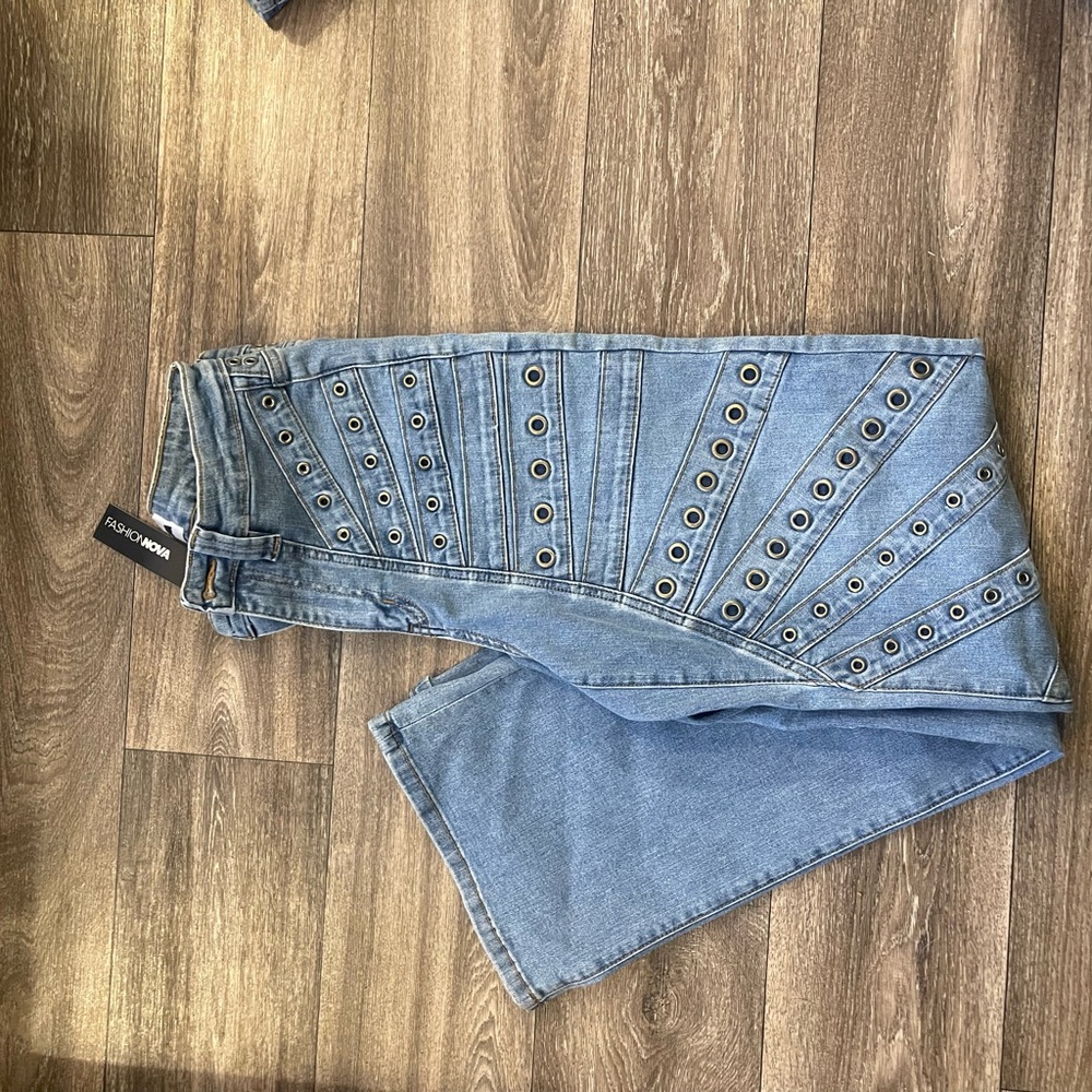 Fashion Nova Blue Flare Jeans with Eyelet Design